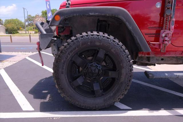 used 2014 Jeep Wrangler Unlimited car, priced at $12,988