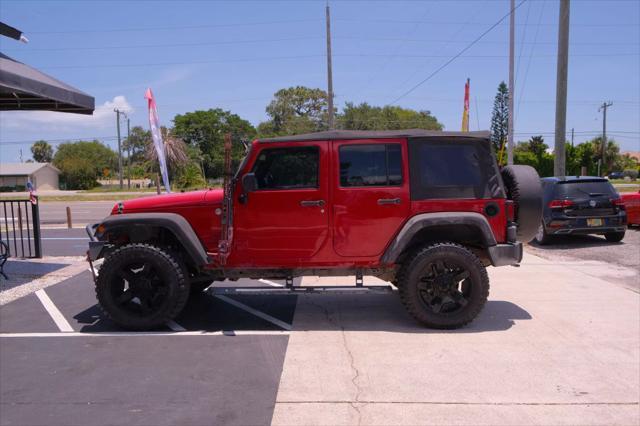 used 2014 Jeep Wrangler Unlimited car, priced at $12,988