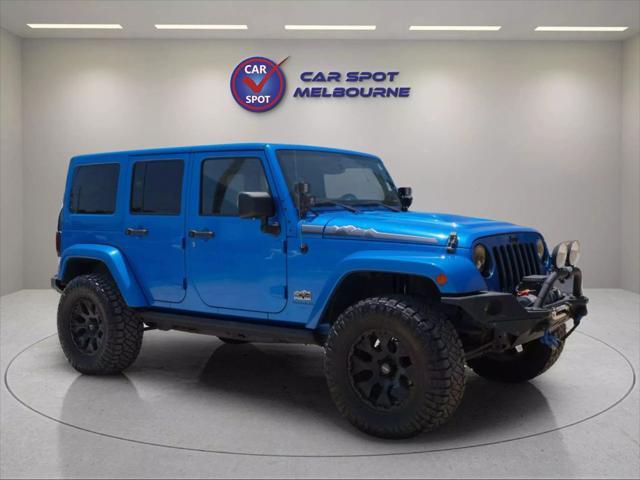 used 2014 Jeep Wrangler Unlimited car, priced at $22,444