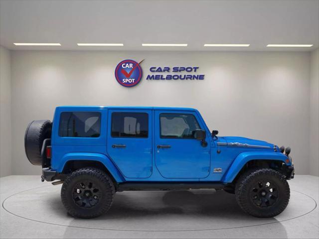 used 2014 Jeep Wrangler Unlimited car, priced at $22,444