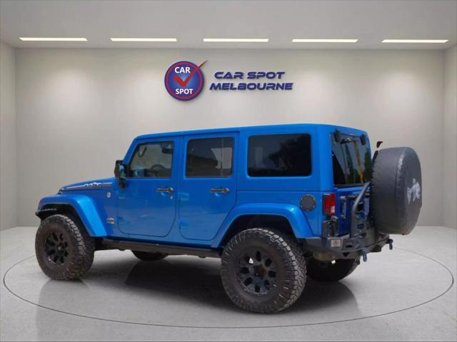 used 2014 Jeep Wrangler Unlimited car, priced at $22,444