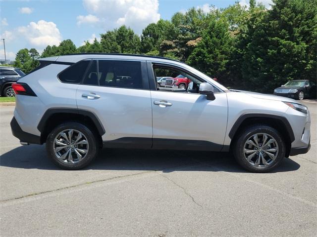 used 2022 Toyota RAV4 Hybrid car, priced at $25,000