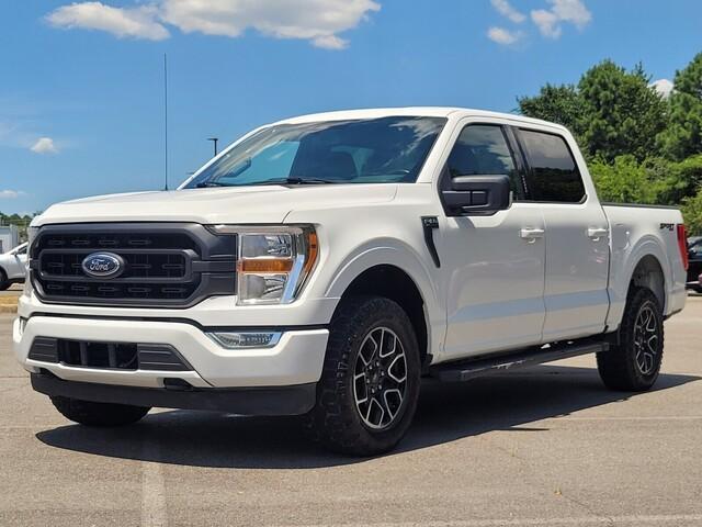 used 2021 Ford F-150 car, priced at $33,733