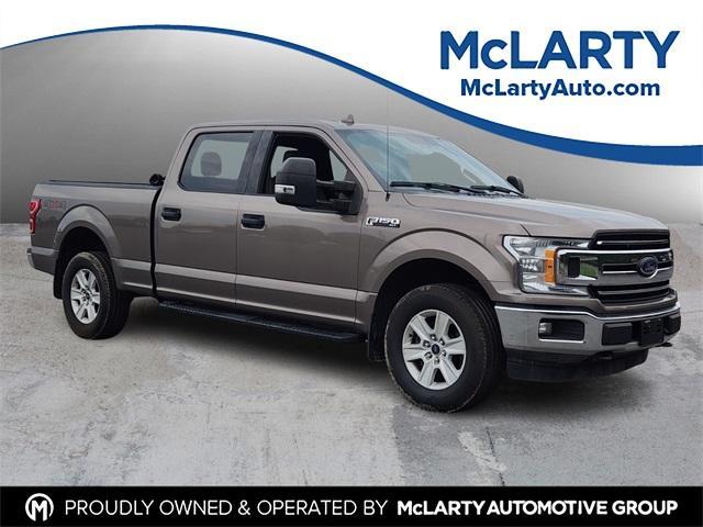 used 2018 Ford F-150 car, priced at $25,114