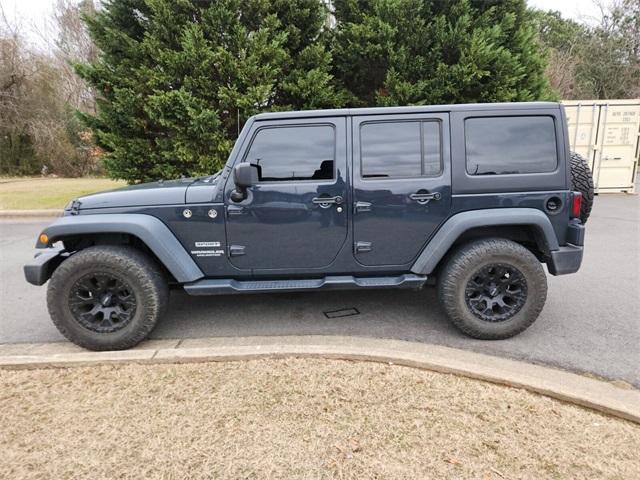 used 2017 Jeep Wrangler Unlimited car, priced at $24,181