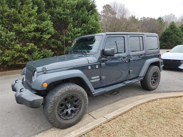 used 2017 Jeep Wrangler Unlimited car, priced at $24,181