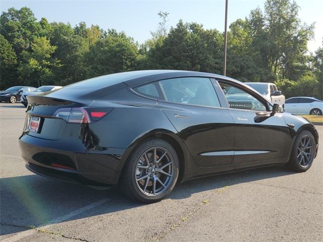 used 2021 Tesla Model 3 car, priced at $20,000