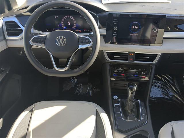 new 2025 Volkswagen Taos car, priced at $28,496