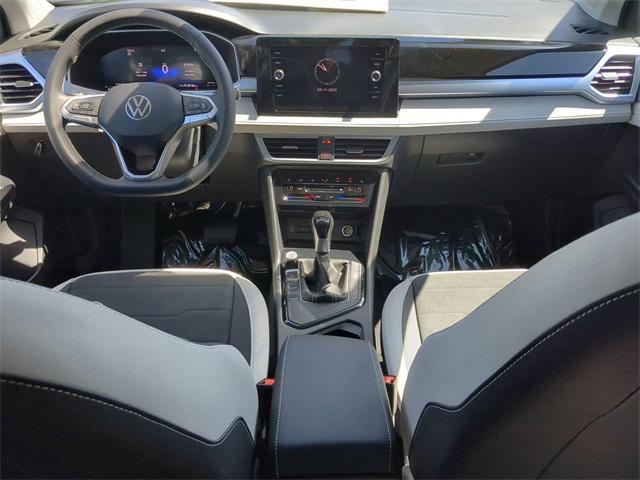 new 2025 Volkswagen Taos car, priced at $28,433