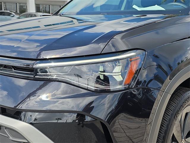 used 2025 Volkswagen Taos car, priced at $21,690