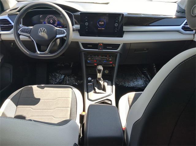new 2025 Volkswagen Taos car, priced at $29,028
