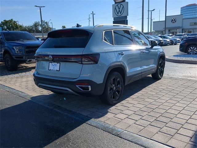 new 2025 Volkswagen Taos car, priced at $30,068