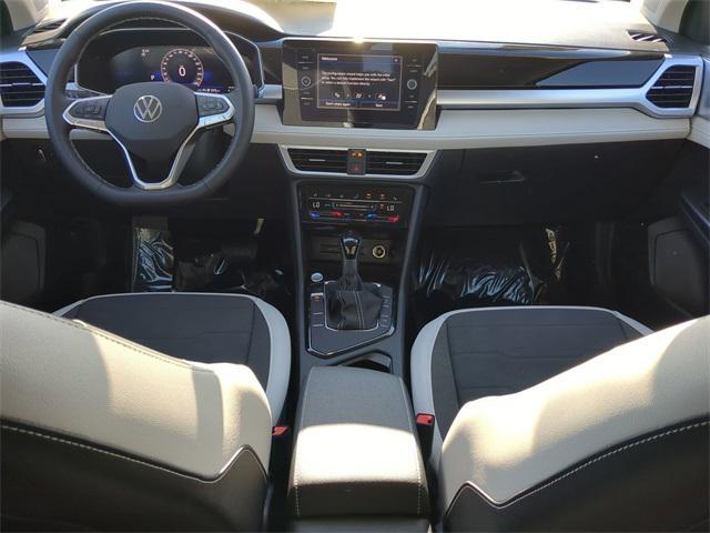 new 2025 Volkswagen Taos car, priced at $30,068