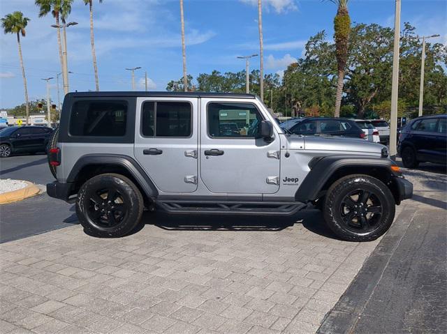 used 2021 Jeep Wrangler Unlimited car, priced at $29,875