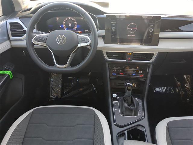 new 2025 Volkswagen Taos car, priced at $28,169