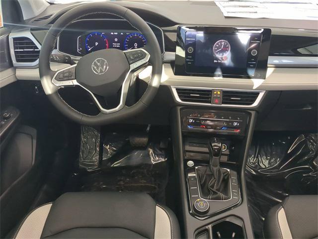 new 2025 Volkswagen Taos car, priced at $36,302