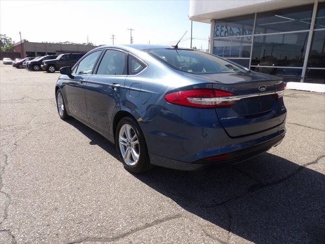 used 2018 Ford Fusion car, priced at $7,997
