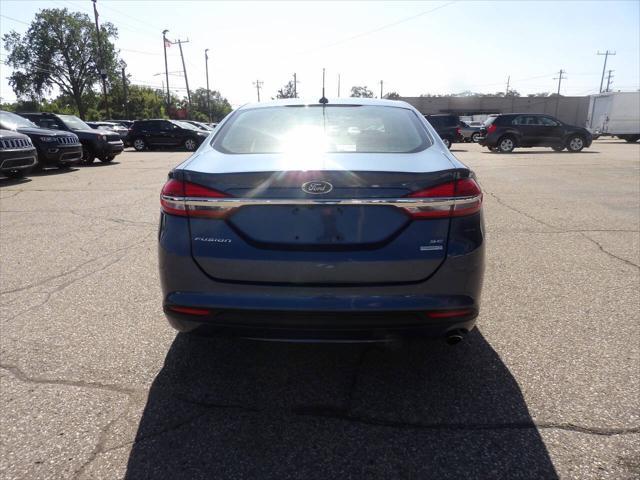 used 2018 Ford Fusion car, priced at $7,997
