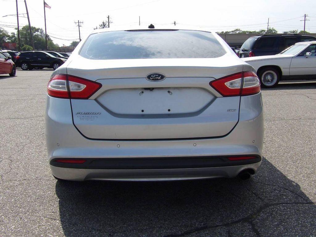 used 2015 Ford Fusion car, priced at $6,497