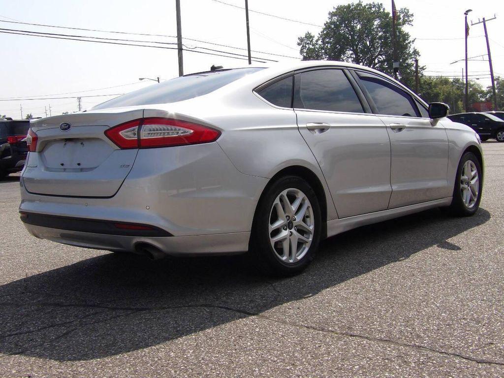 used 2015 Ford Fusion car, priced at $6,497