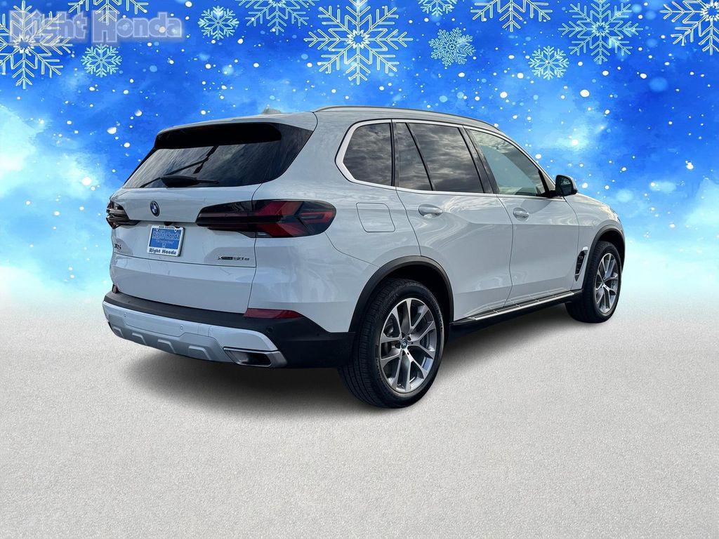used 2024 BMW X5 PHEV car, priced at $46,128