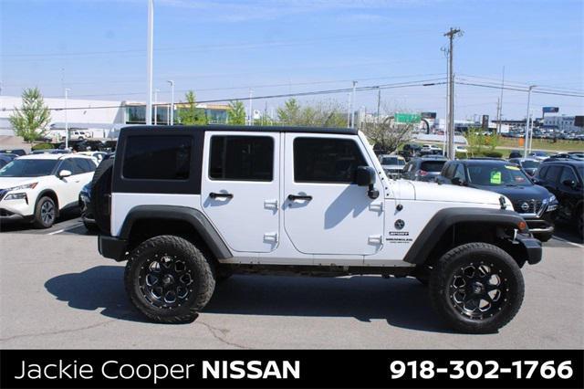 used 2014 Jeep Wrangler Unlimited car, priced at $20,389