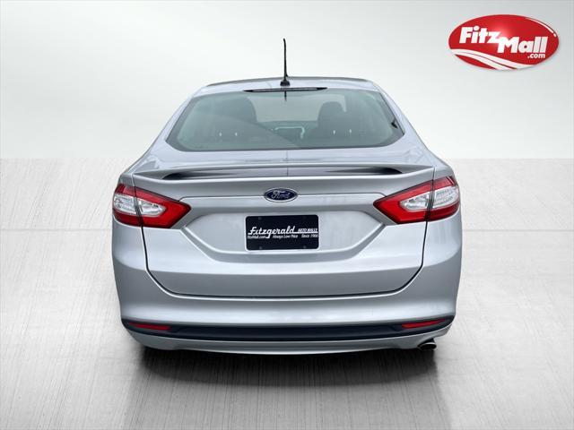 used 2014 Ford Fusion car, priced at $6,200