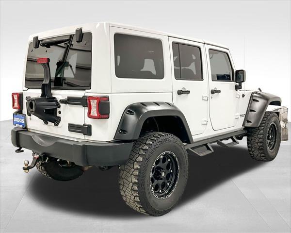 used 2015 Jeep Wrangler Unlimited car, priced at $22,249