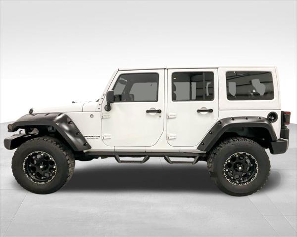 used 2015 Jeep Wrangler Unlimited car, priced at $22,249