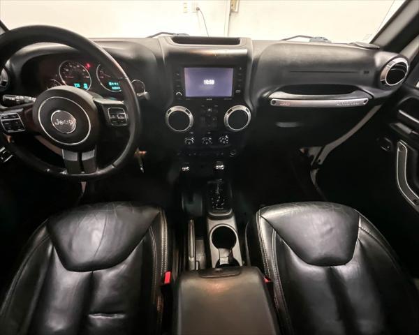 used 2015 Jeep Wrangler Unlimited car, priced at $22,249