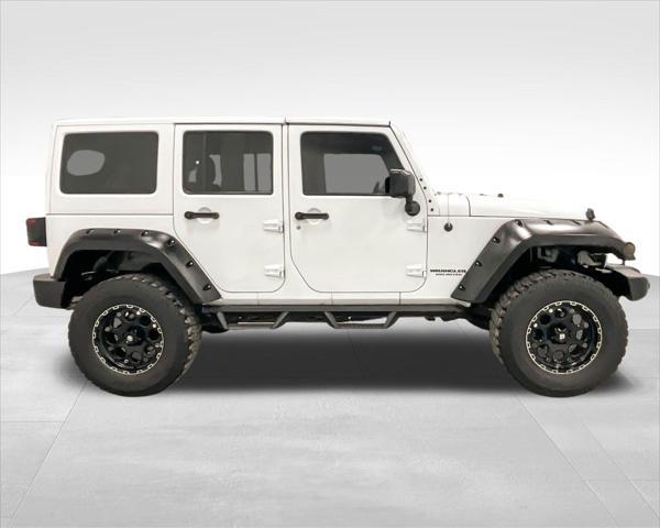 used 2015 Jeep Wrangler Unlimited car, priced at $22,249