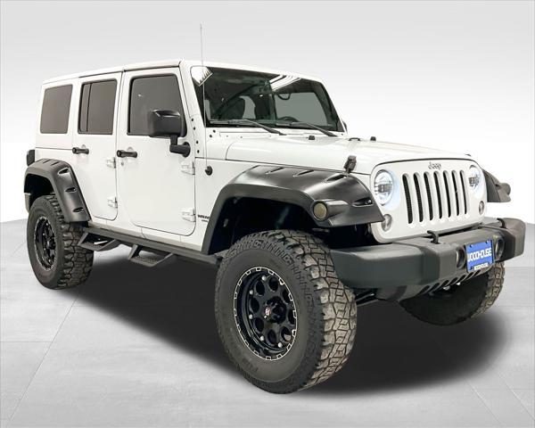 used 2015 Jeep Wrangler Unlimited car, priced at $22,249