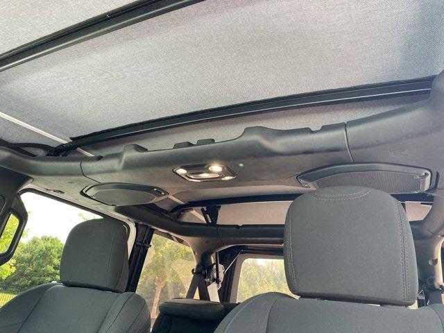 used 2022 Jeep Wrangler Unlimited car, priced at $31,857