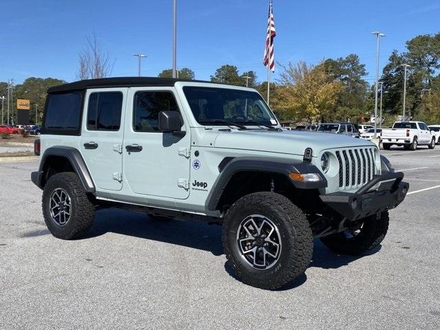 used 2024 Jeep Wrangler car, priced at $33,397