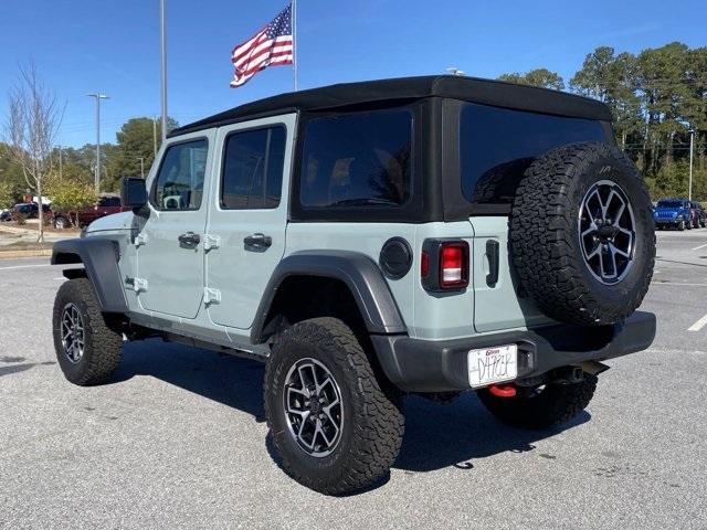 used 2024 Jeep Wrangler car, priced at $33,397