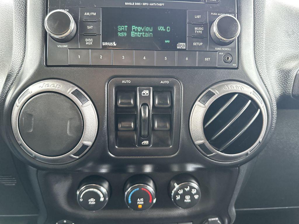 used 2016 Jeep Wrangler Unlimited car, priced at $15,999