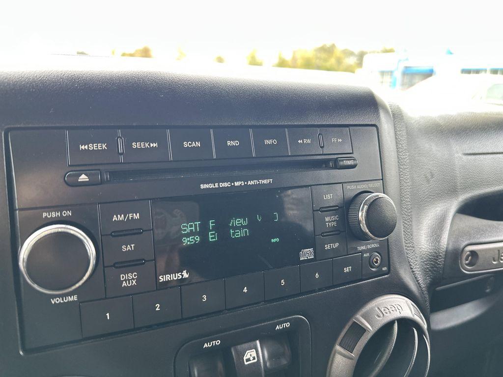 used 2016 Jeep Wrangler Unlimited car, priced at $15,999