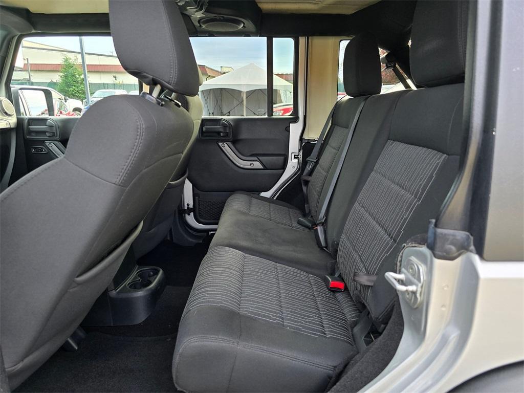 used 2011 Jeep Wrangler Unlimited car, priced at $13,980