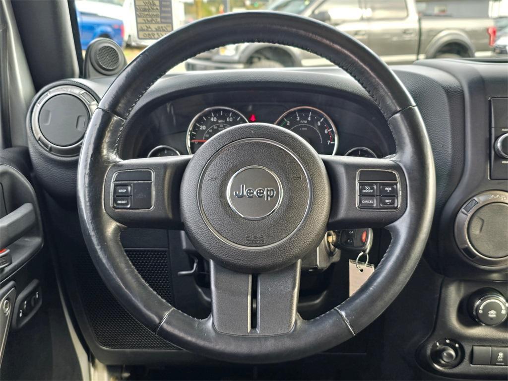 used 2011 Jeep Wrangler Unlimited car, priced at $13,980