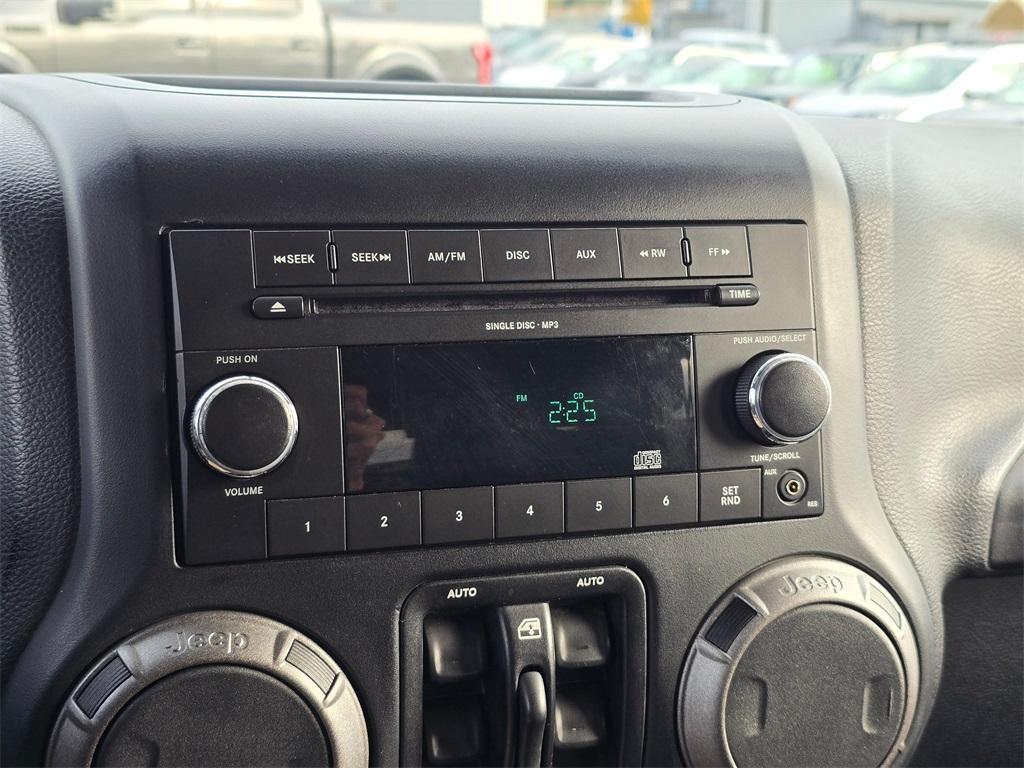 used 2011 Jeep Wrangler Unlimited car, priced at $13,980