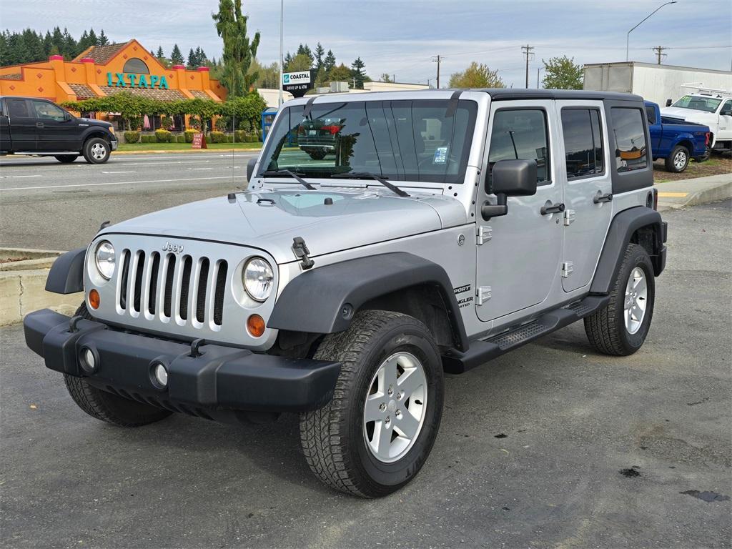 used 2011 Jeep Wrangler Unlimited car, priced at $13,980