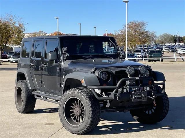 used 2013 Jeep Wrangler Unlimited car, priced at $15,498