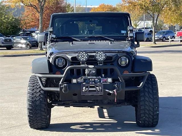 used 2013 Jeep Wrangler Unlimited car, priced at $15,498