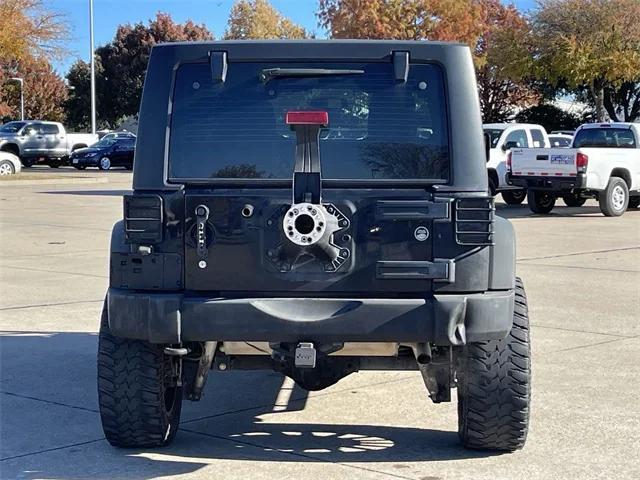 used 2013 Jeep Wrangler Unlimited car, priced at $15,498