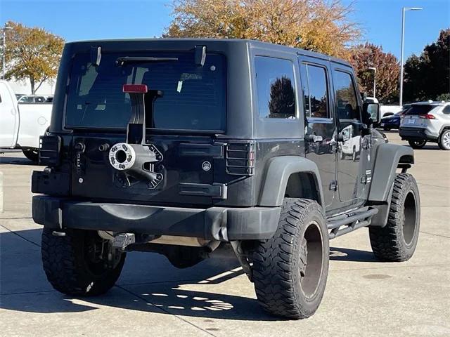 used 2013 Jeep Wrangler Unlimited car, priced at $15,498