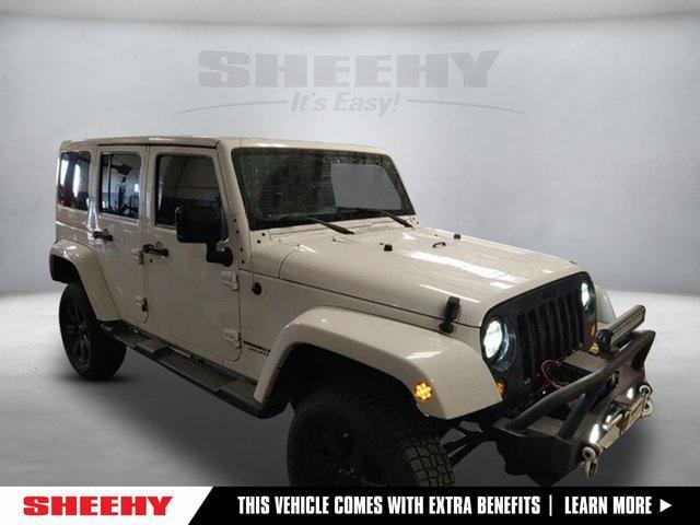 used 2014 Jeep Wrangler Unlimited car, priced at $15,241