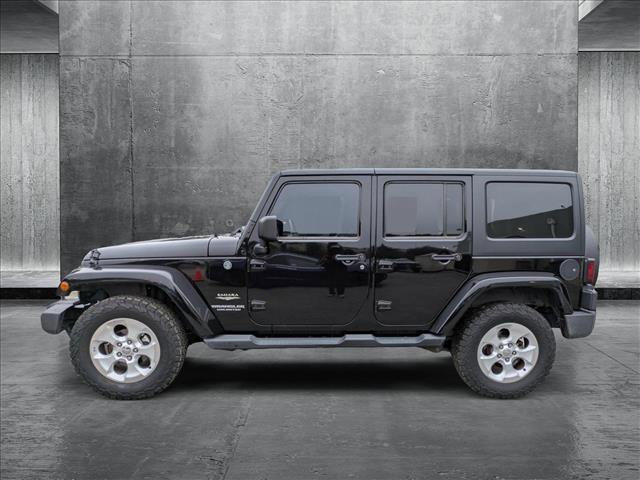 used 2014 Jeep Wrangler Unlimited car, priced at $17,497