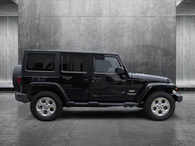 used 2014 Jeep Wrangler Unlimited car, priced at $17,497