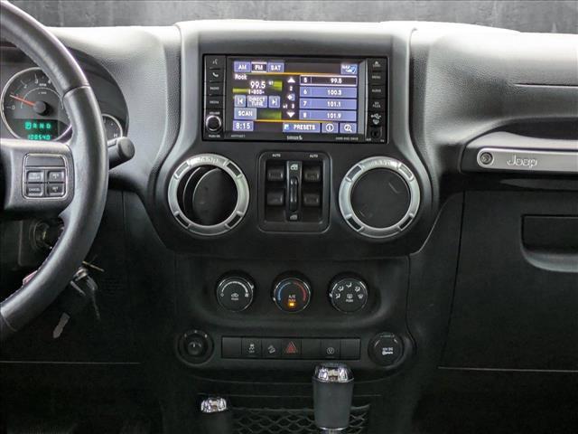 used 2014 Jeep Wrangler Unlimited car, priced at $17,497