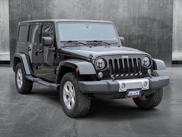 used 2014 Jeep Wrangler Unlimited car, priced at $17,497